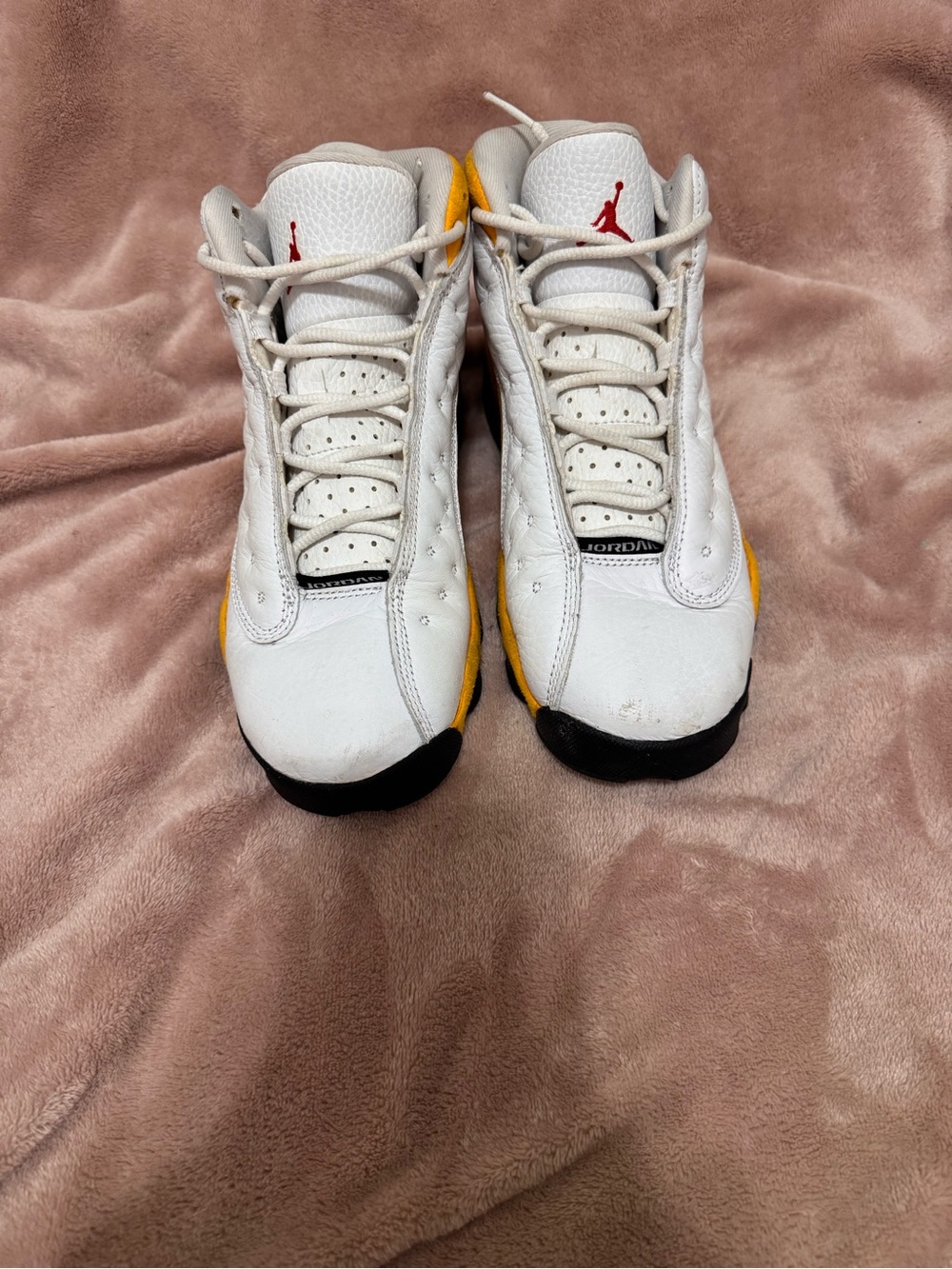 Jordan 13 Retro White Sneakers with Yellow and Black Accents